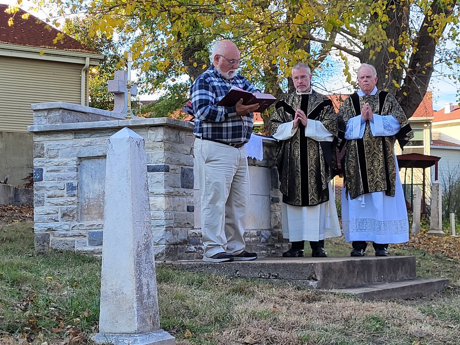Father Jeremy Secrist, pastor of St. Peter Parish in Jefferson City, offers Mass in the recently restored St. Peter Cemetery 1, in which burials took place from the 1840s until about 1880, on All Souls Day.